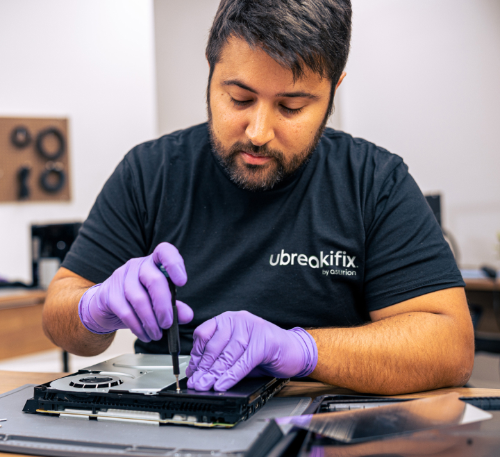 uBreakiFix expert fixing a PlayStation